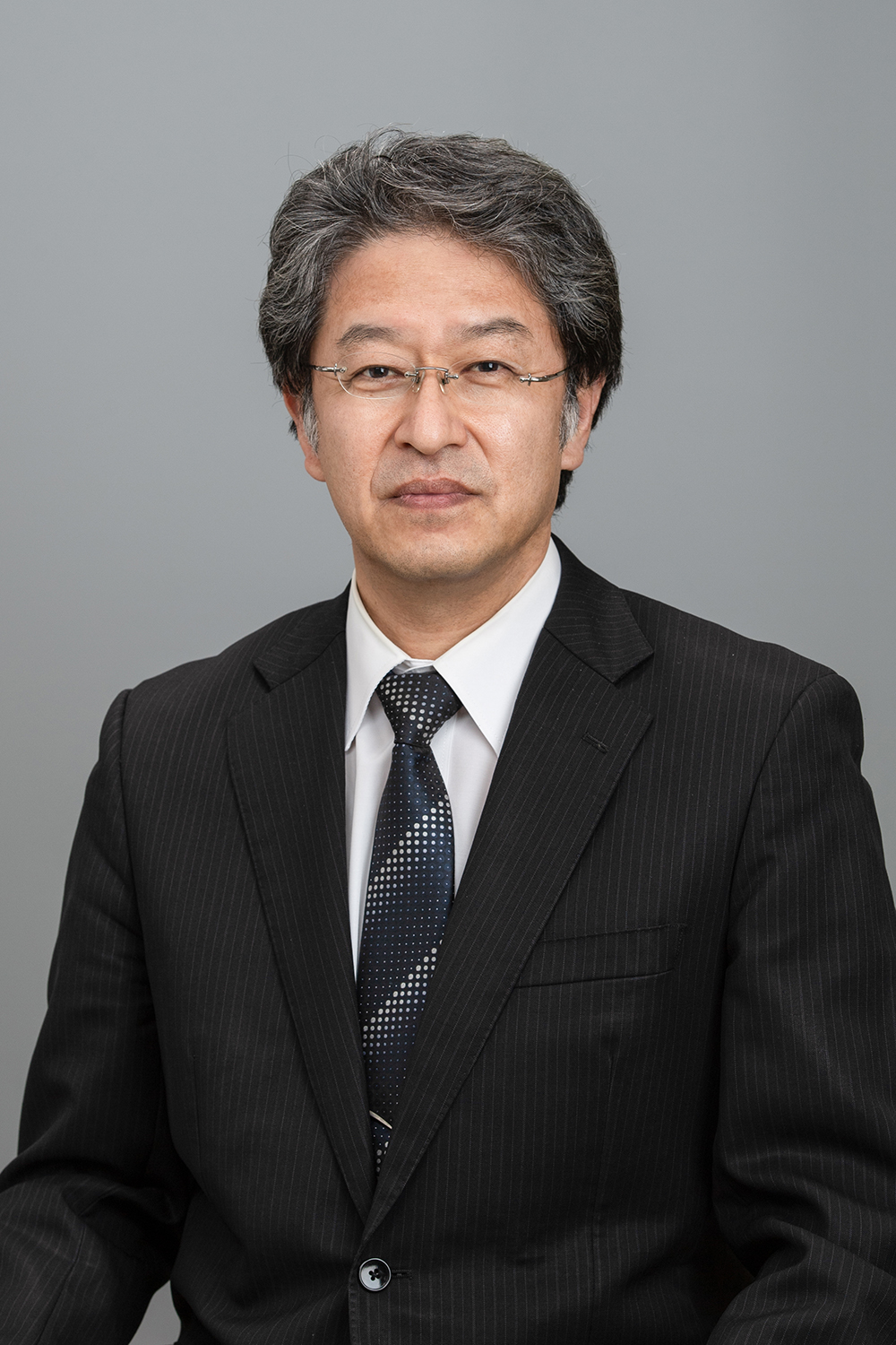学校長 菅谷 毅